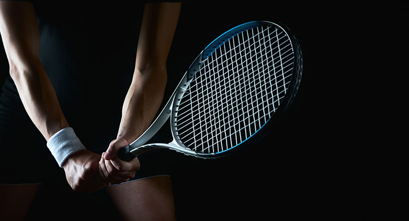 Frau mit Tennisschläger