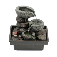 Zimmerbrunnen in Steinoptik mit Kieselsteinen