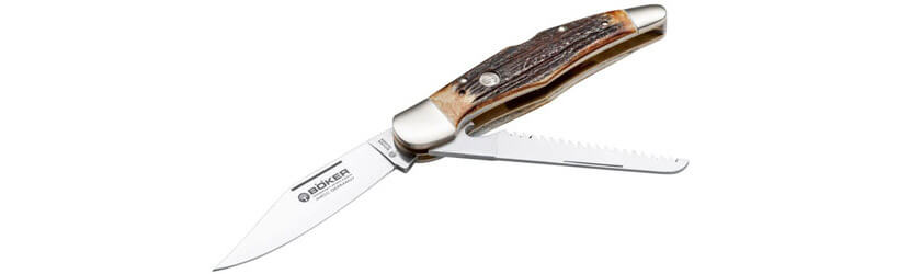 Outdoormesser von Böker mit ausgeklappter Clip-Point-Klinge und Säge