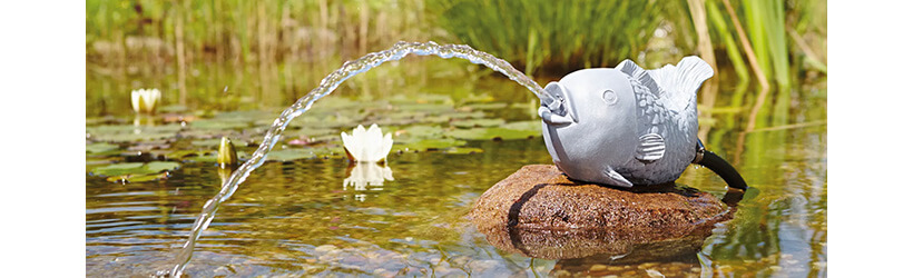 Fisch als Gartenfigur des Wasserspeiers