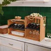 Wooden crates used as wine racks on a kitchen counter. Podgląd zdjęcia produktu