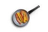 A frying pan with carrots inside, presented on a white background. Podgląd zdjęcia produktu