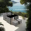 A rattan furniture set on a patio overlooking the ocean. Náhled obrázku produktu