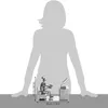 A silhouette of a person is shown behind a metal figurine of a gamer sitting at a desk with a computer and controller. Dimensions are indicated. Náhled obrázku produktu