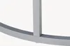A close-up view of the silver metal frame of a table. Voir les images du produit