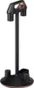 A black and bronze cordless vacuum cleaner stand. Podgląd zdjęcia produktu