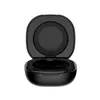 An open black charging case for earbuds. Voir les images du produit