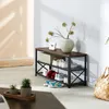 A shoe rack with shoes and decorative items in a hallway. Náhled obrázku produktu