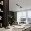 A modern home office with a desk, chairs, and a large window overlooking a city. Voir les images du produit