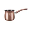 A rose gold metallic line coffee pot with a brown handle is shown against a white background. Podgląd zdjęcia produktu