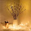Decorative LED branch lights in a vase, with a small potted plant and fairy lights. Anteprima dell’immagine prodotto
