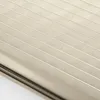 A close-up view of a pleated blind or roller blind. Produktbild-Vorschau