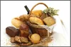 Wallario Wandbild Brot und Brötchen im eleganten Korb - mit Produktbild-Vorschau 1