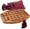 A wooden Bao game board with colorful stones and two fabric bags. Náhled obrázku produktu