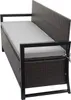 A poly-rattan storage bench with a gray cushion, shown from a side angle against a white background. Náhled obrázku produktu