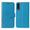 A blue flip cover phone case with a floral and butterfly design is shown open, displaying the inside and the exterior. Produktbild-Vorschau