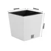 A white square planter with textured sides, shown with dimensions indicated. Náhľad obrázku produktu