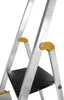 Close-up view of the steps and connecting parts of an aluminum stepladder. Anteprima dell’immagine prodotto