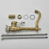 A disassembled vintage-style faucet and its components laid out on a white background. Náhľad obrázku produktu