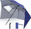 A blue and gray beach umbrella with side panels and a window, set against a white background. Accessories like stakes and a rope are laid out in front.