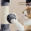 A cat playing with a dangling ball on a cat tree. Produktbild-Vorschau