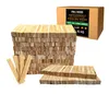 A box of kindling wood and stacks of kindling wood are displayed against a white background. Produktbild-Vorschau