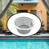 A white plastic skimmer basket is shown in the center of the image, superimposed over a background of a swimming pool and a house. Produktbild-Vorschau