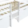 Close-up view of a white bunk bed frame with wooden slats and drawers. Voir les images du produit