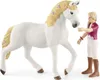 A toy horse and a toy person standing next to each other against a white background. Náhľad obrázku produktu