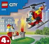 A LEGO City fire helicopter is shown flying over a scene with a LEGO firefighter grilling hot dogs. Voir les images du produit