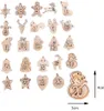 A collection of small wooden Christmas-themed ornaments, each with a number from 1 to 24, arranged on a white background. Produktbild-Vorschau