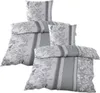 A stack of bedding sets with a floral and striped pattern. Produktbild-Vorschau