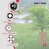 A tree protected by a brown plastic guard in a grassy outdoor setting. Produktbild-Vorschau