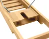 A close-up view of a wooden bath caddy with metal supports. Produktbild-Vorschau