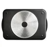 The bottom view of a black roasting pan with a silver, circular, textured insert in the center. Náhľad obrázku produktu