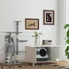 A cat tree and a cat litter box enclosure are shown in a room. Náhled obrázku produktu