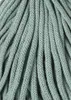 A close-up, detailed view of a bundle of thick, braided cord in a light green color. Produktbild-Vorschau