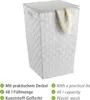 A white woven laundry basket with a lid and a towel draped over the edge, shown against a white background. Text describing features is present below the basket. Anteprima dell’immagine prodotto