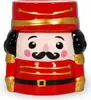A front view of a nutcracker-shaped scented candle. Produktbild-Vorschau