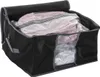 A black fabric storage box with a clear window, containing vacuum-sealed pink clothing. Produktbild-Vorschau