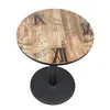 A round table with a wood-grain top featuring Roman numerals, set against a white background. Produktbild-Vorschau