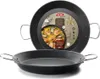 Two paella pans are shown, one stacked on top of the other. The top pan has a label with an image of paella. Produktbild-Vorschau