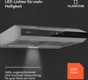 A modern kitchen range hood with LED lighting. Produktbild-Vorschau