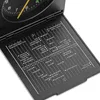 A close-up view of an open travel alarm clock showing its time zone chart. Voir les images du produit