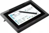 A Wacom digital pen display tablet is shown with a form on its screen. Produktbild-Vorschau