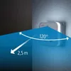 A diagram showing the detection range of a Hama LED night light with a socket and USB ports. Voir les images du produit