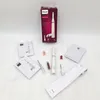 A collection of items related to a Philips personal grooming device, including its packaging, accessories, and instruction manuals, laid out on a white surface. Náhled obrázku produktu