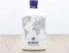 A bottle of Nordés Atlantic Galician Gin is displayed on a wooden surface against a white background. Náhled obrázku produktu
