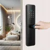 A hand is shown using a smart door lock with fingerprint and keypad access, with a modern living room visible in the background. Náhled obrázku produktu