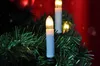 Close-up of LED candle lights on a Christmas tree. Produktbild-Vorschau